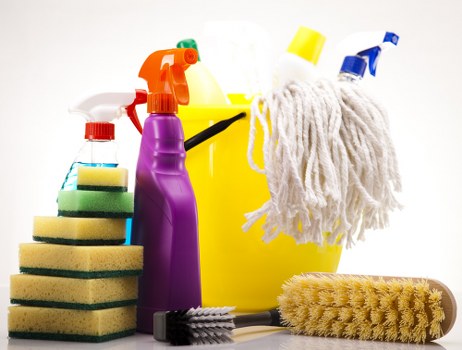 Carpet cleaner checking a room for hazards before work